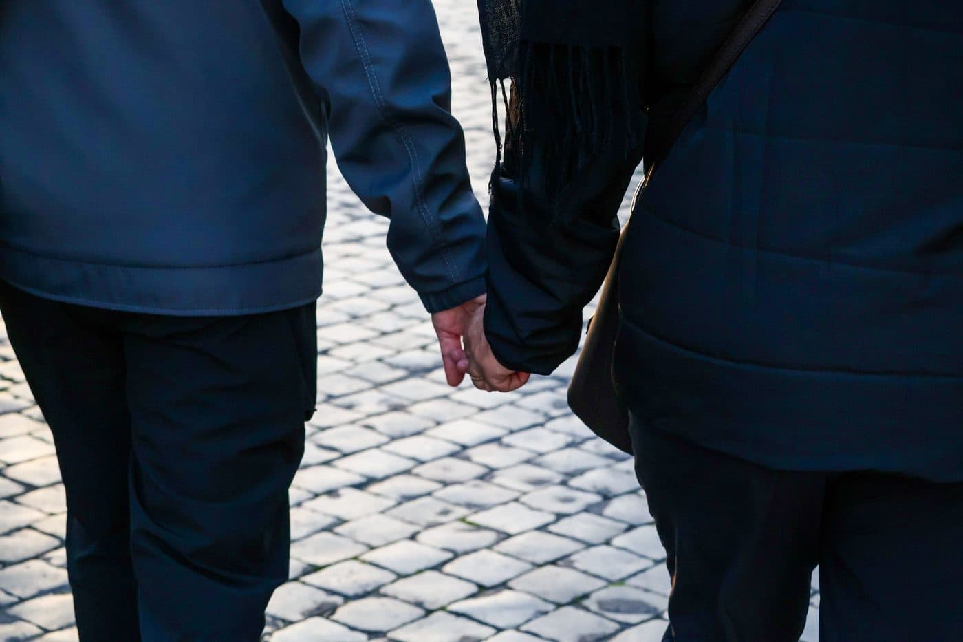 A couple walking together outdoors
